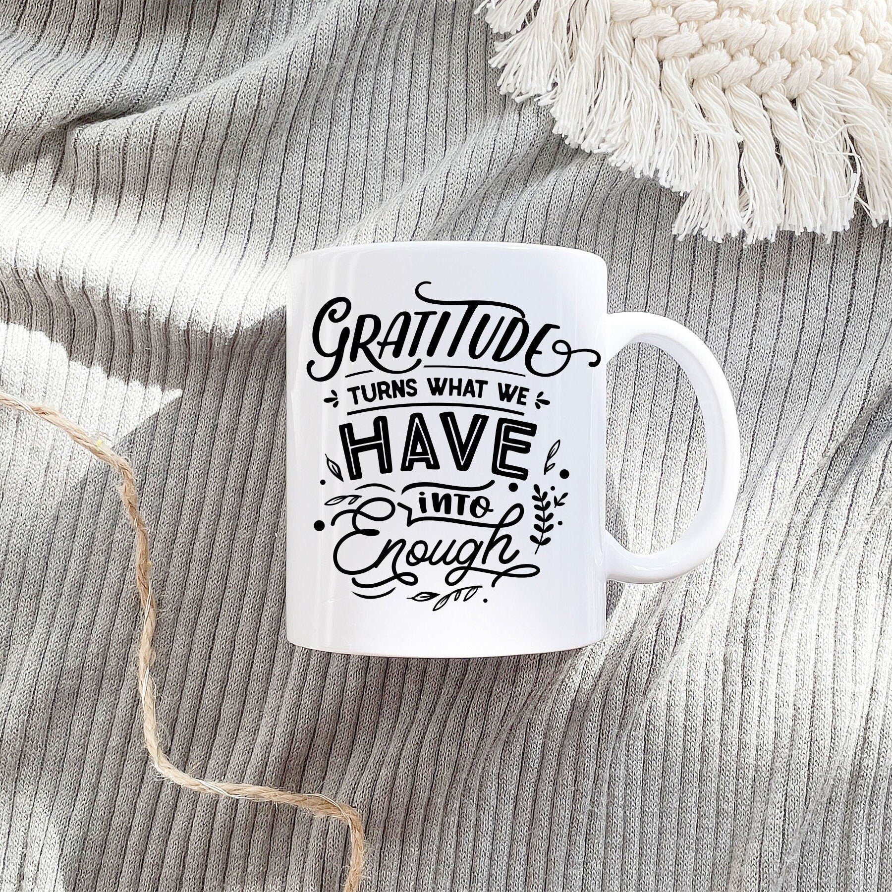 Thanksgiving Mug with the phrase 'Gratitude Turns What We Have Into Enough' printed on both sides, showcasing autumn colors.