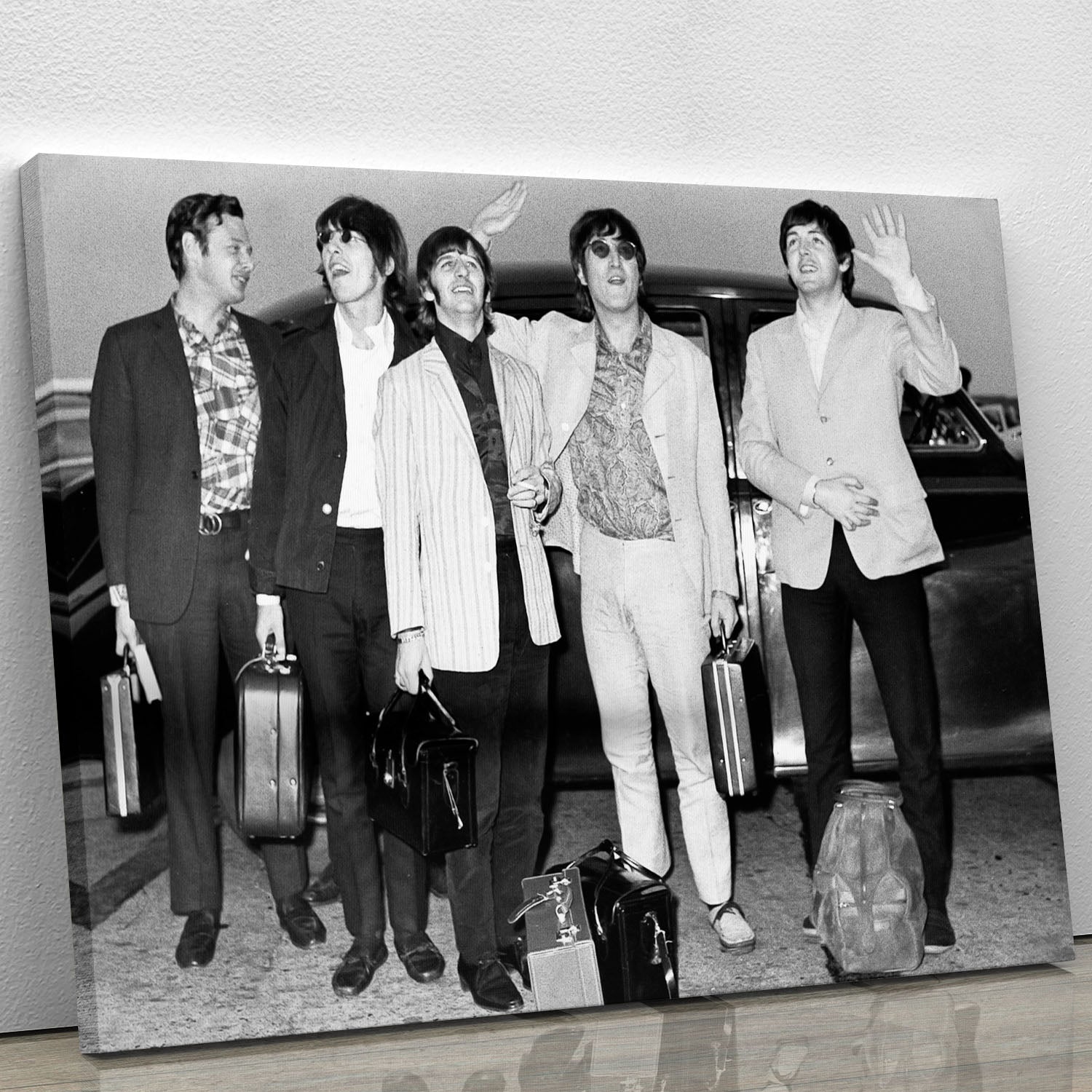 Canvas print of The Beatles and Brian Epstein at London Airport, showcasing iconic musicians in a vintage style.