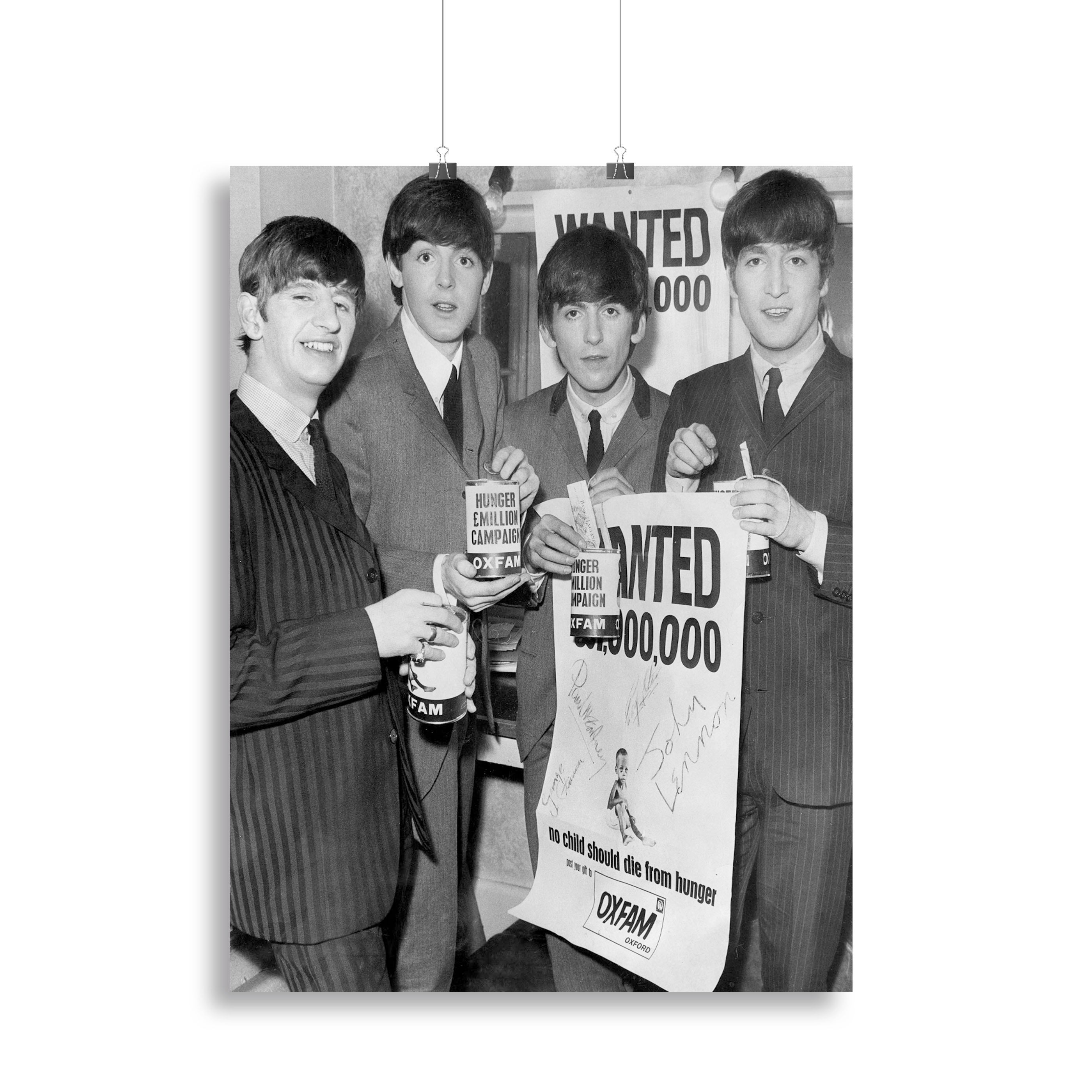 Canvas print featuring The Beatles with Oxfam poster design, showcasing vibrant colors and iconic imagery.