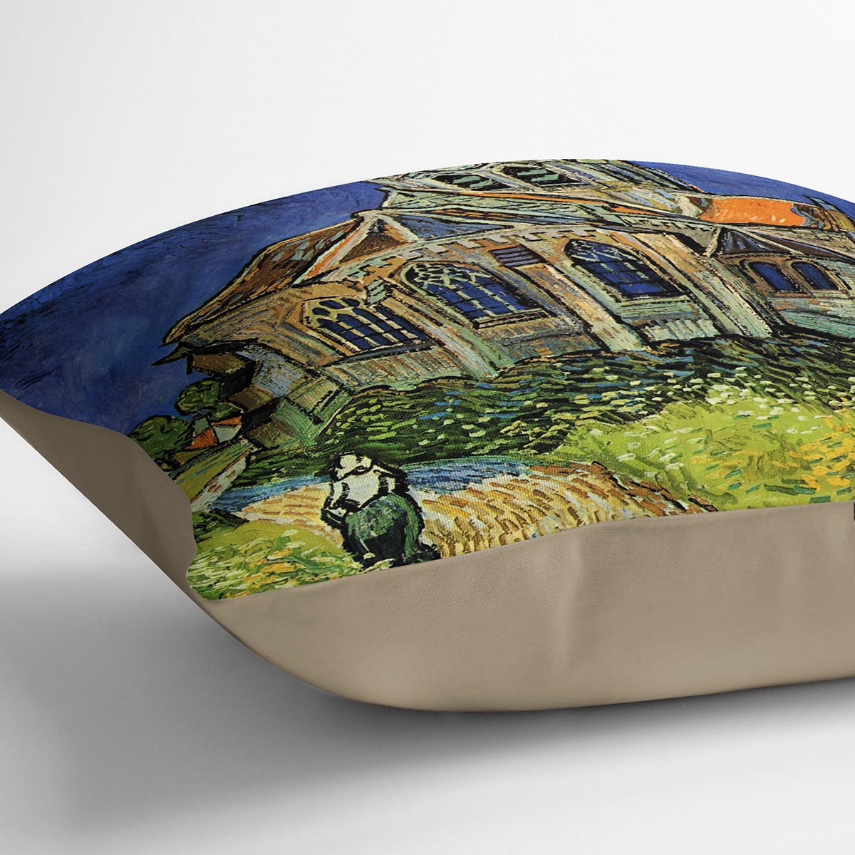A vibrant cushion featuring Van Gogh's The Church at Auvers, made from luxurious vegan faux suede with plump filling.