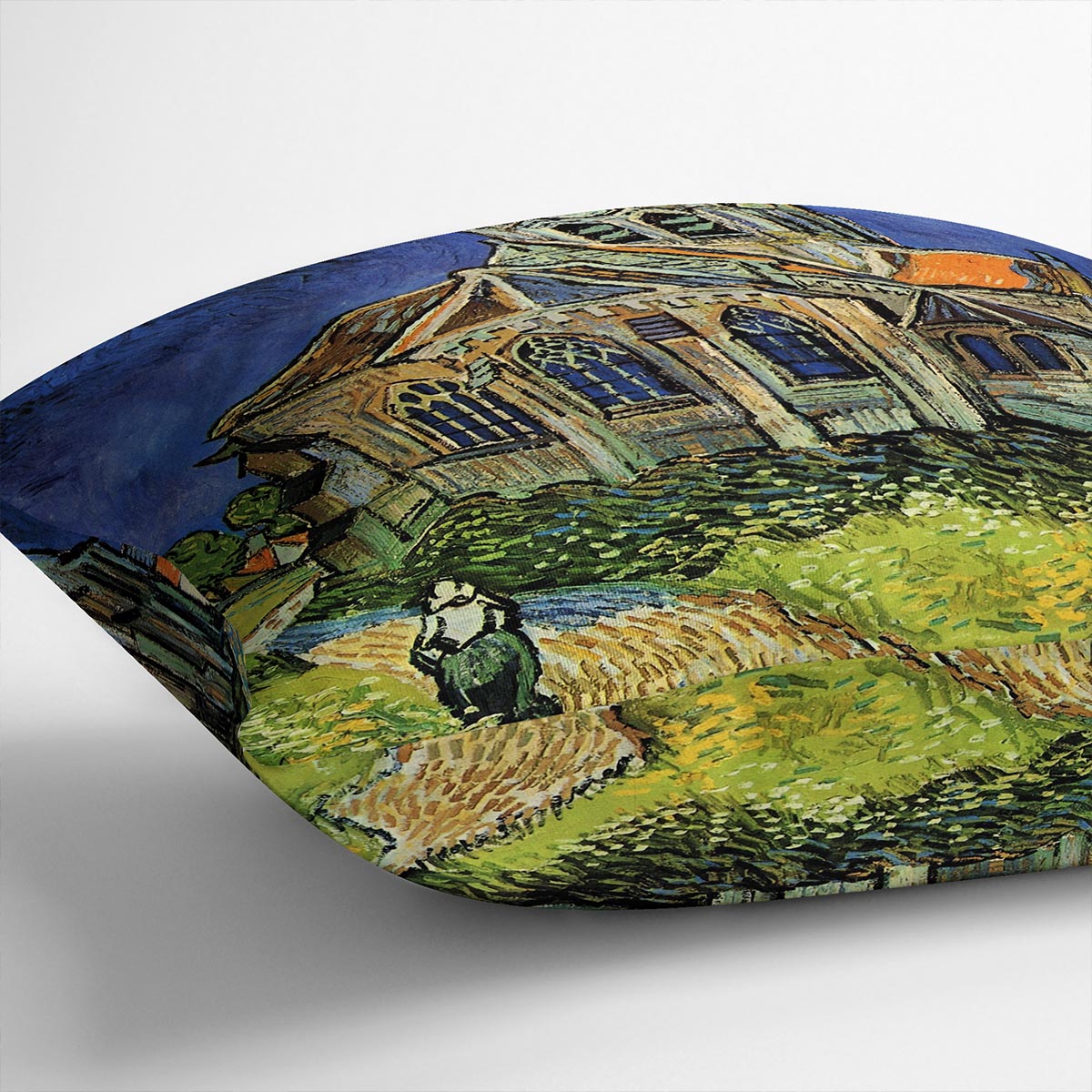 A vibrant cushion featuring Van Gogh's The Church at Auvers, made from luxurious vegan faux suede with plump filling.
