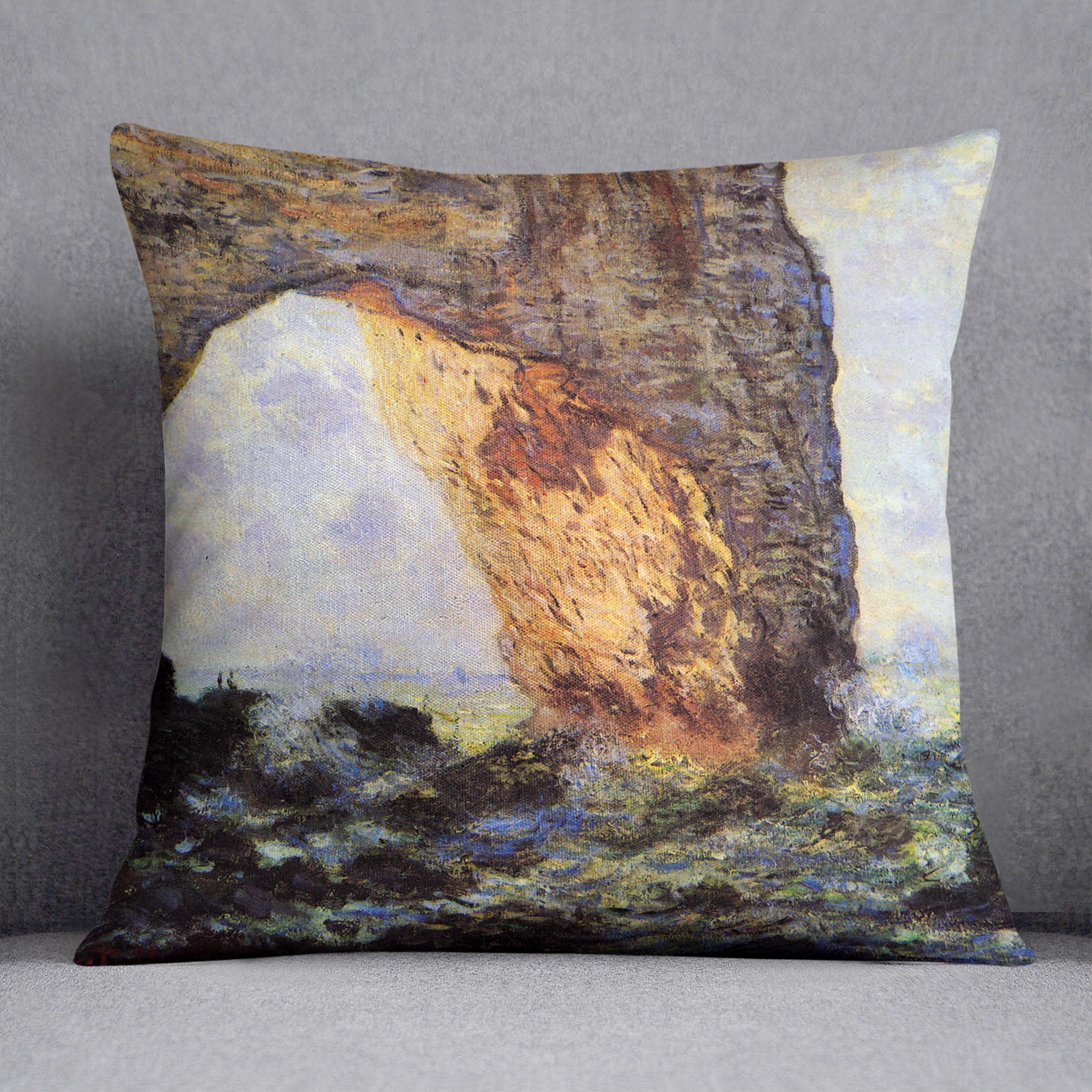 A vibrant cushion featuring Monet's The Cliff at Etretat artwork, made from luxurious vegan faux suede.
