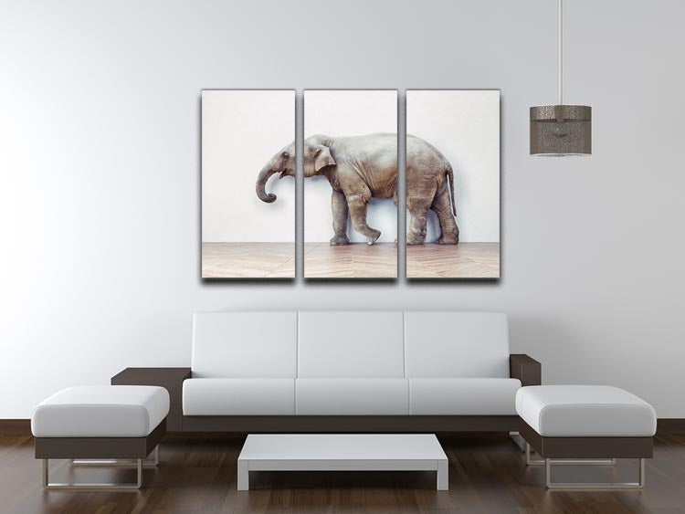Three-panel canvas art featuring a serene elephant design against a white wall, perfect for home decor.
