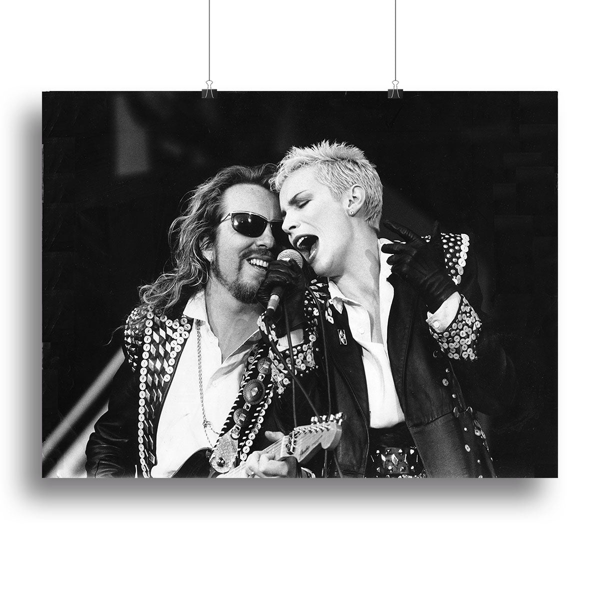 The Eurythmics live canvas print showcasing vibrant colors and iconic imagery of the music duo, perfect for home or office decor.