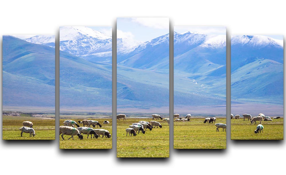 A beautiful 5-split canvas artwork depicting a flock of birds flying under snow-capped mountains, creating a serene and captivating scene.