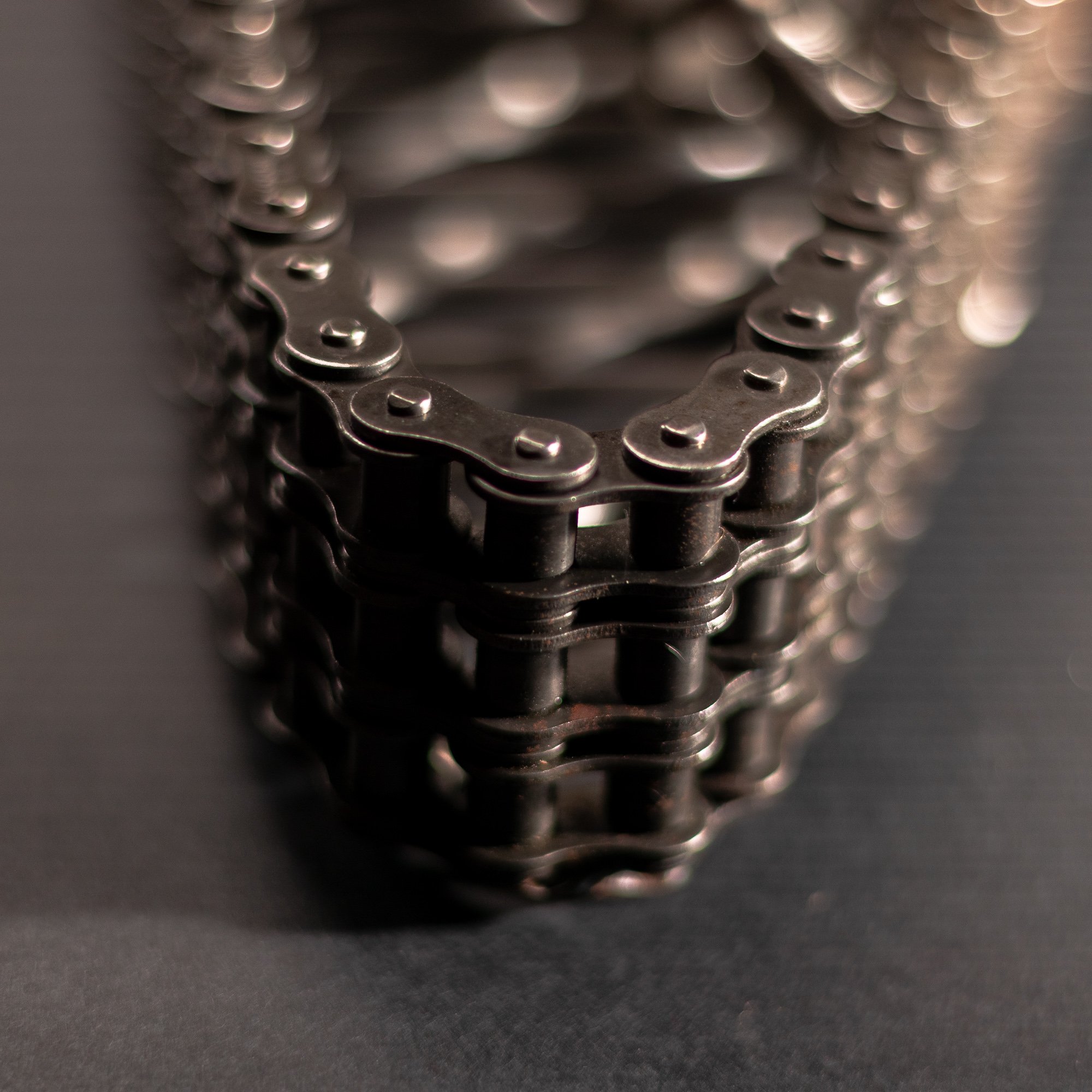 Handmade metal electric guitar sculpture, life-size, crafted from scrap metal with a clear finish.