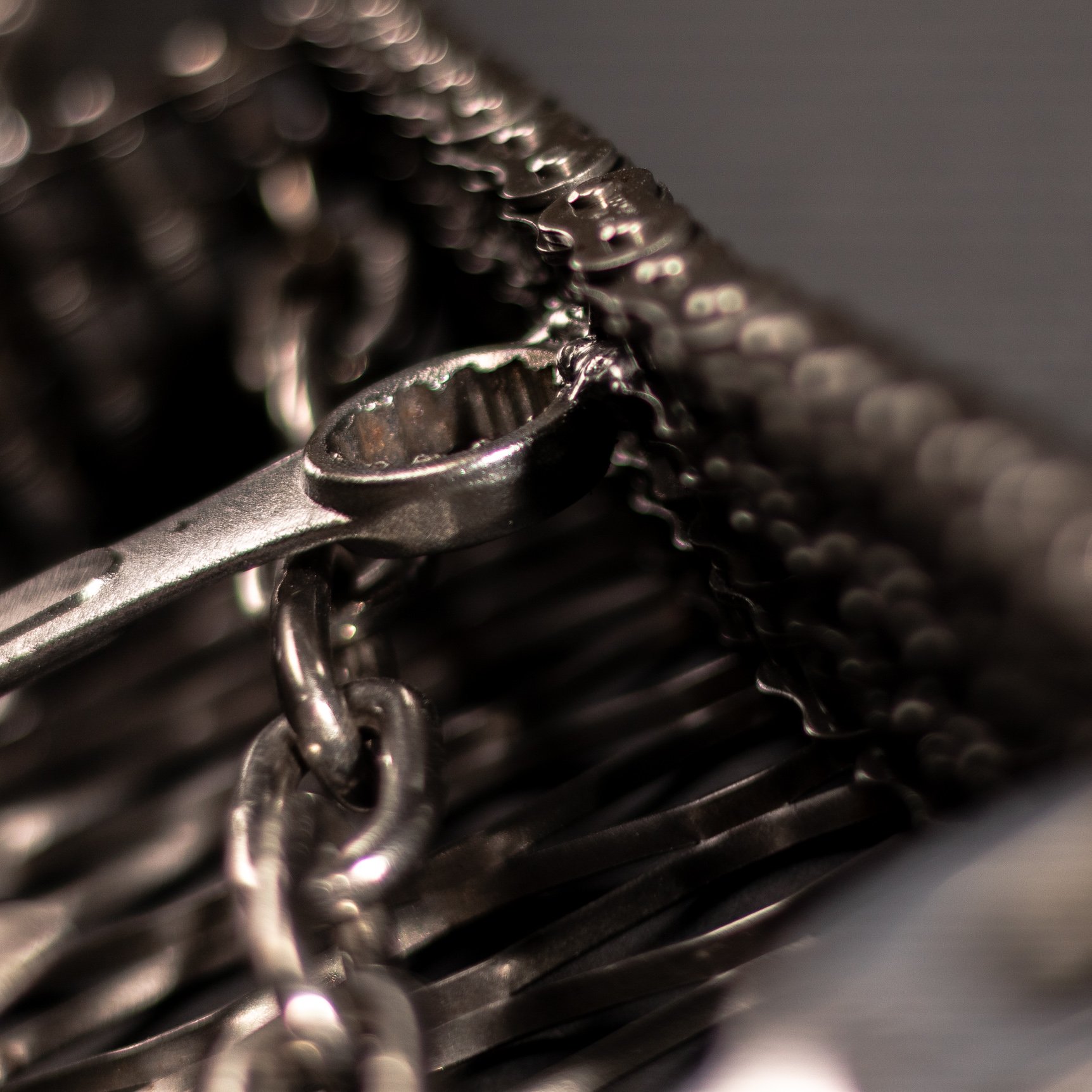 Handmade metal electric guitar sculpture, life-size, crafted from scrap metal with a clear finish.