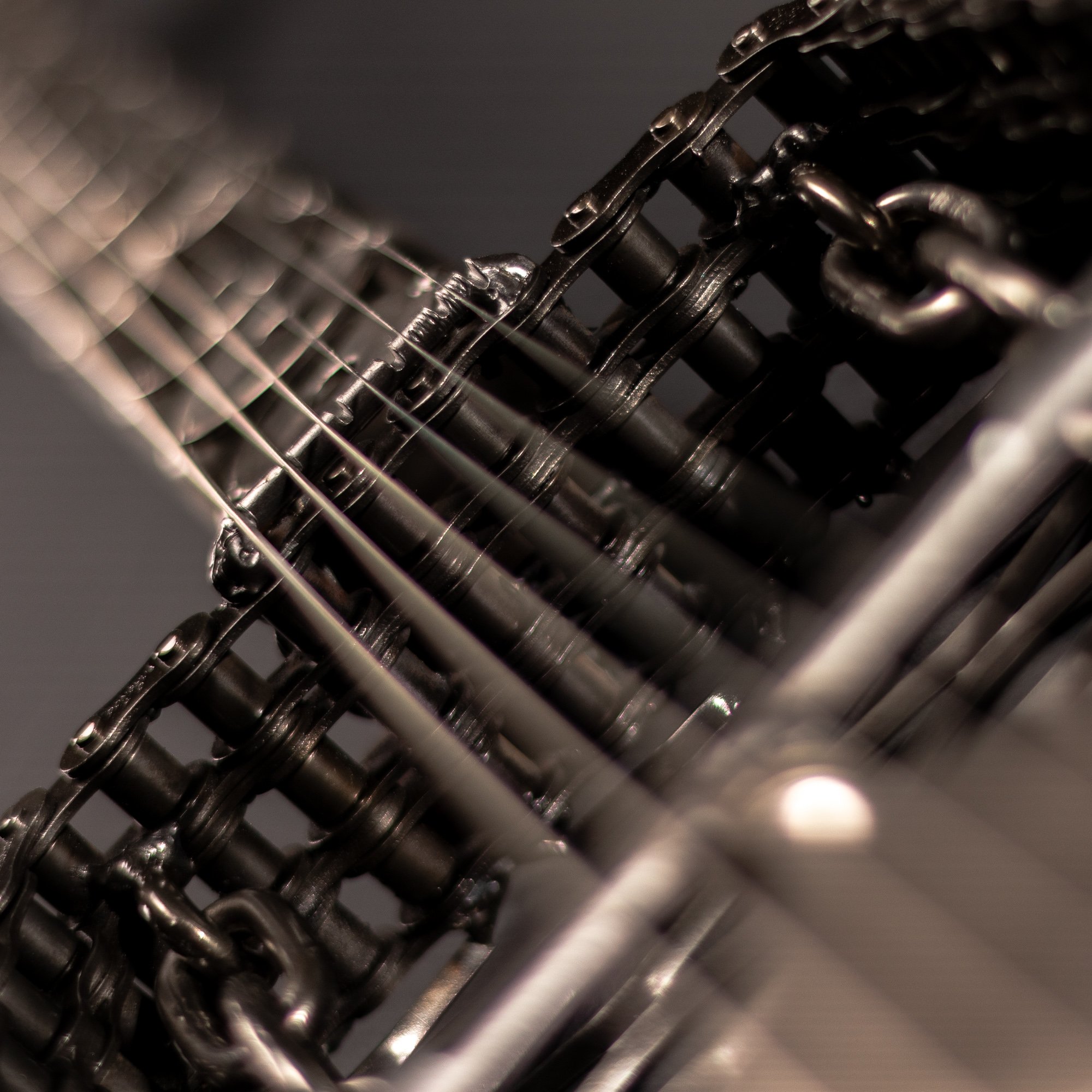 Handmade metal electric guitar sculpture, life-size, crafted from scrap metal with a clear finish.