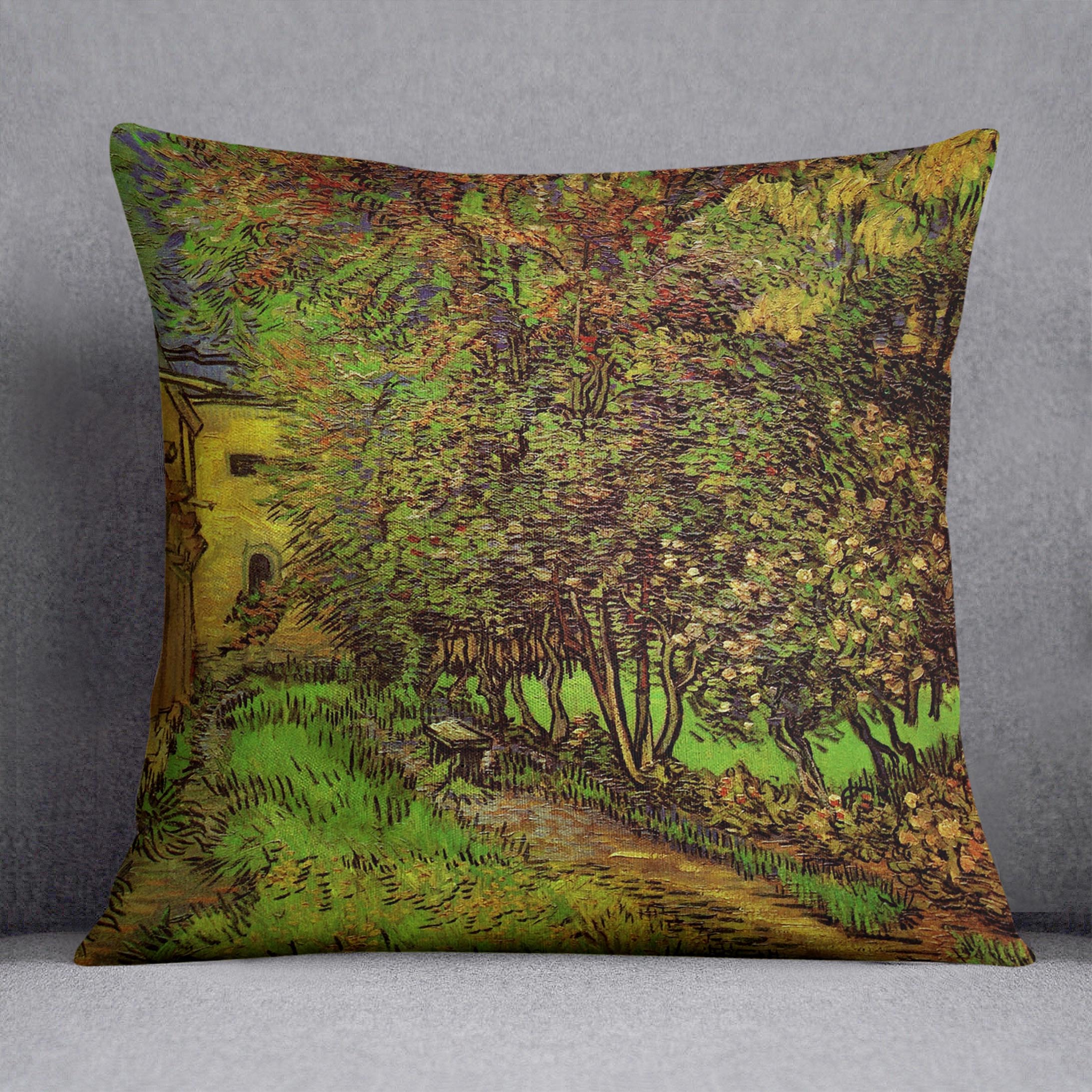 A vibrant cushion featuring Van Gogh's The Garden of Saint-Paul Hospital design, made from luxurious vegan faux suede.