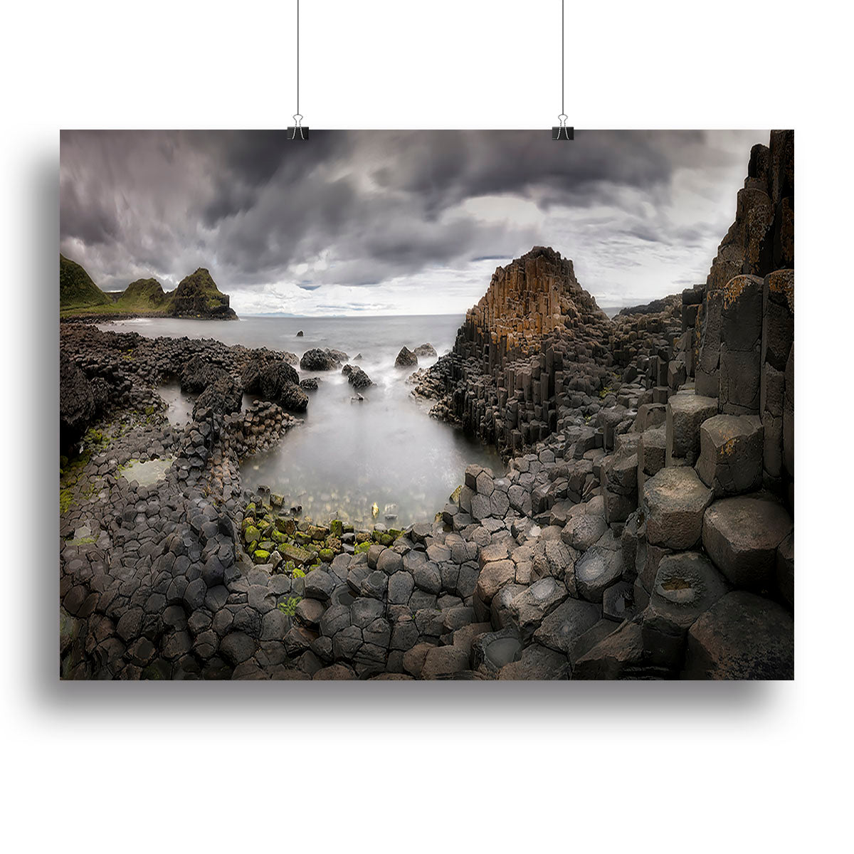 A beautiful canvas print of The Giants Causeway showcasing its unique hexagonal basalt columns and vibrant natural scenery.