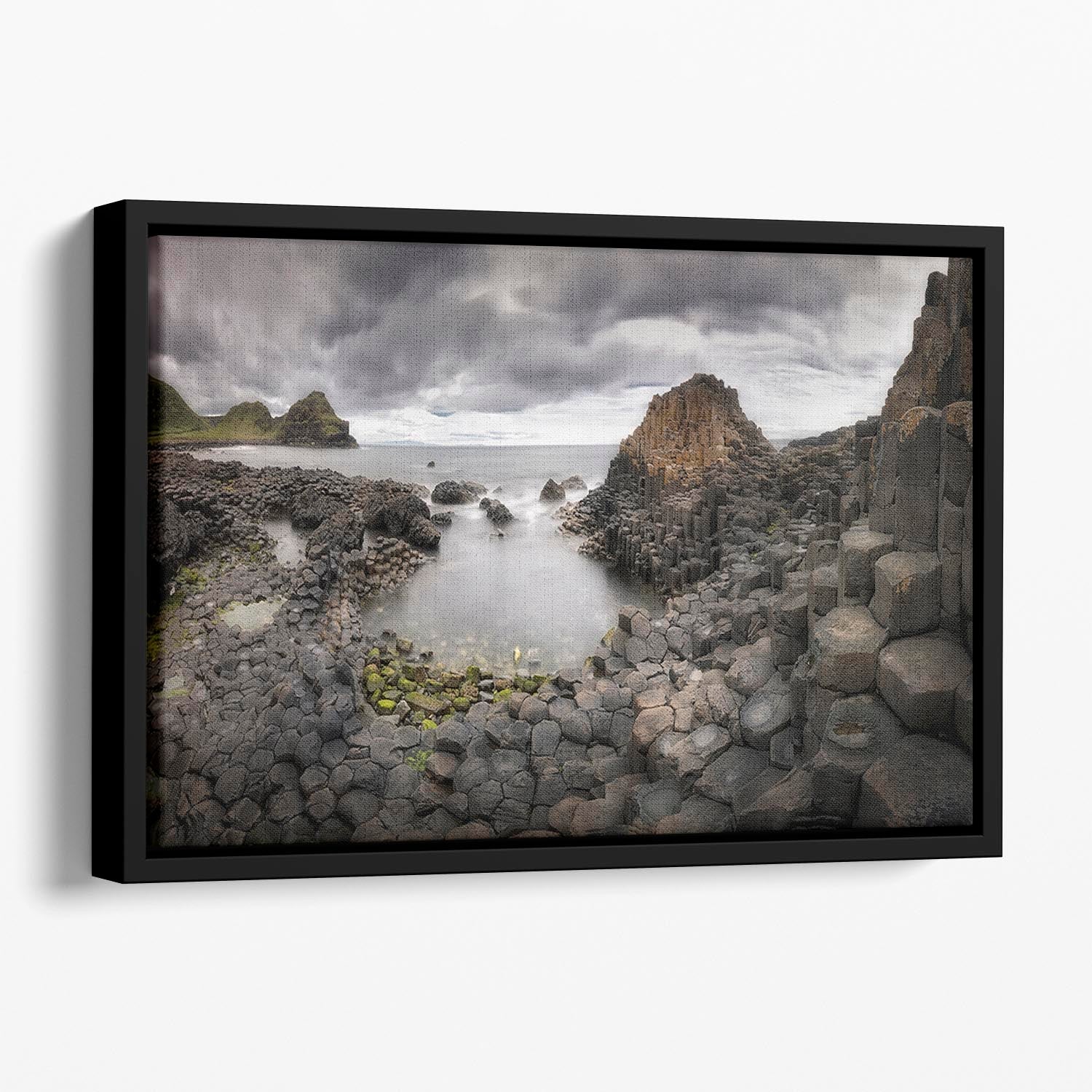 The Giants Causeway Floating Framed Canvas featuring vibrant abstract colors and elegant wooden frame.