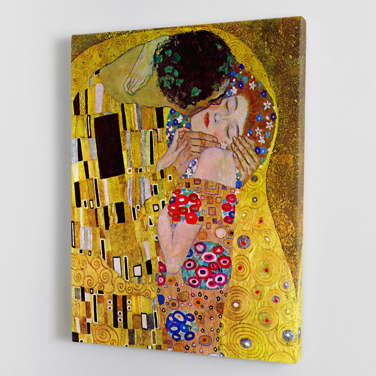 A detailed canvas print of The Kiss by Klimt, showcasing intricate golden patterns and romantic imagery.