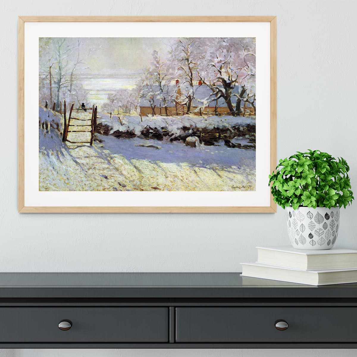 Framed print of The Magpie by Monet, showcasing vibrant colors and intricate details in a handmade frame.