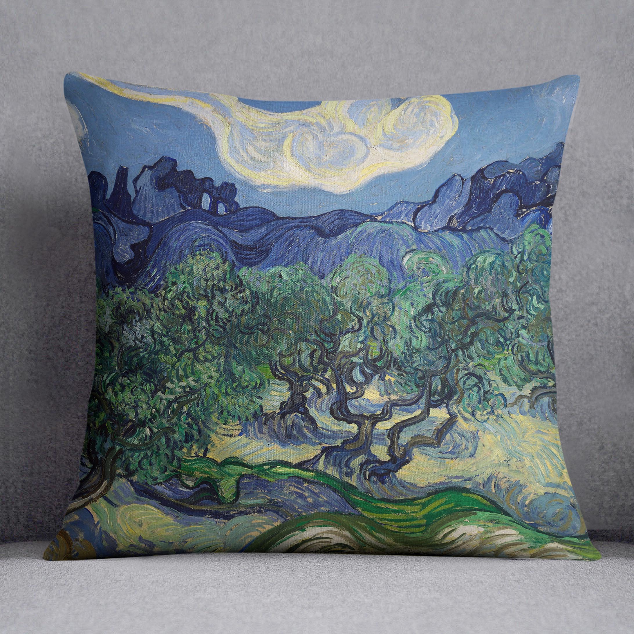 The Olive Trees Cushion featuring vibrant abstract designs on luxurious vegan faux suede, showcasing its plush filling and handmade quality.