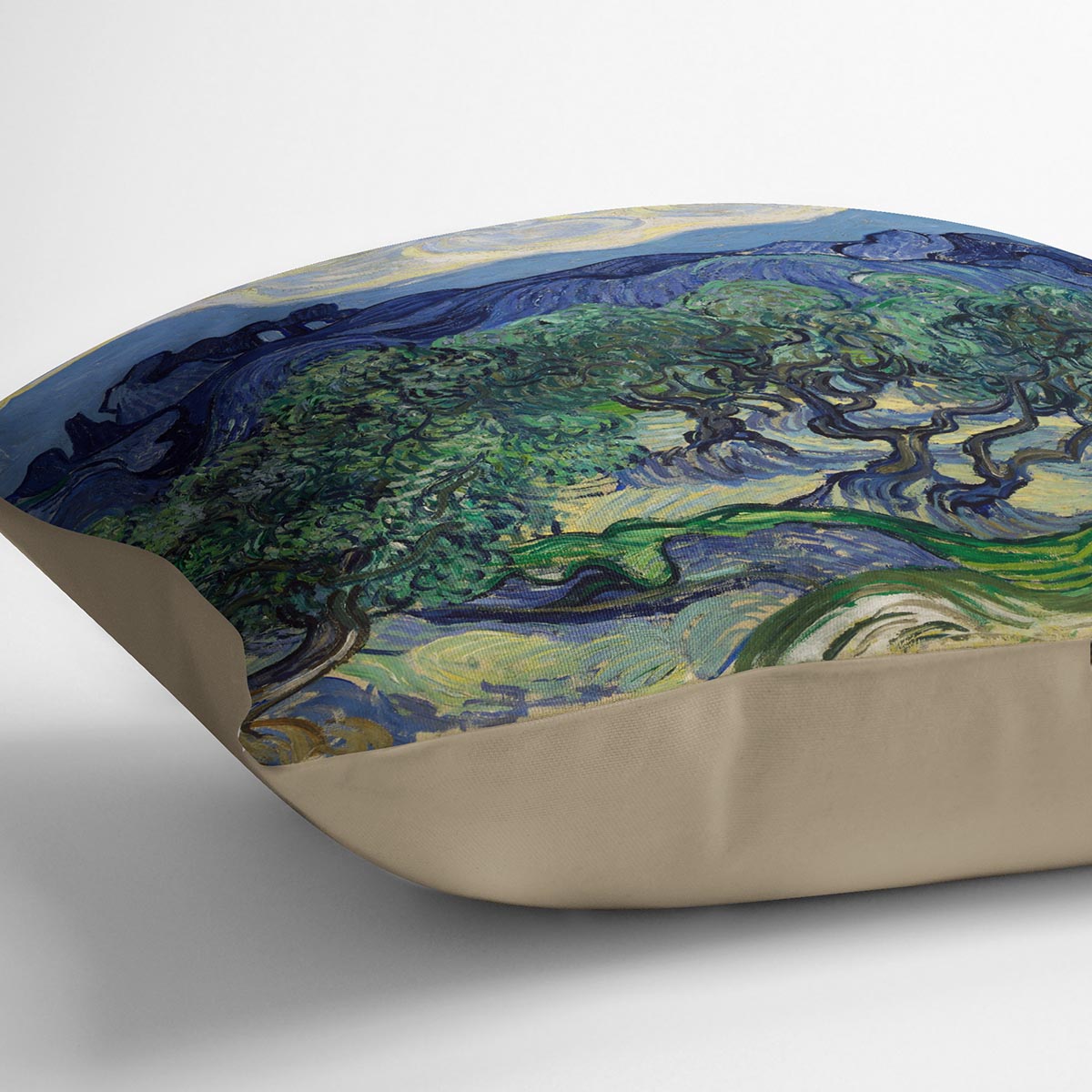 The Olive Trees Cushion featuring vibrant abstract designs on luxurious vegan faux suede, showcasing its plush filling and handmade quality.