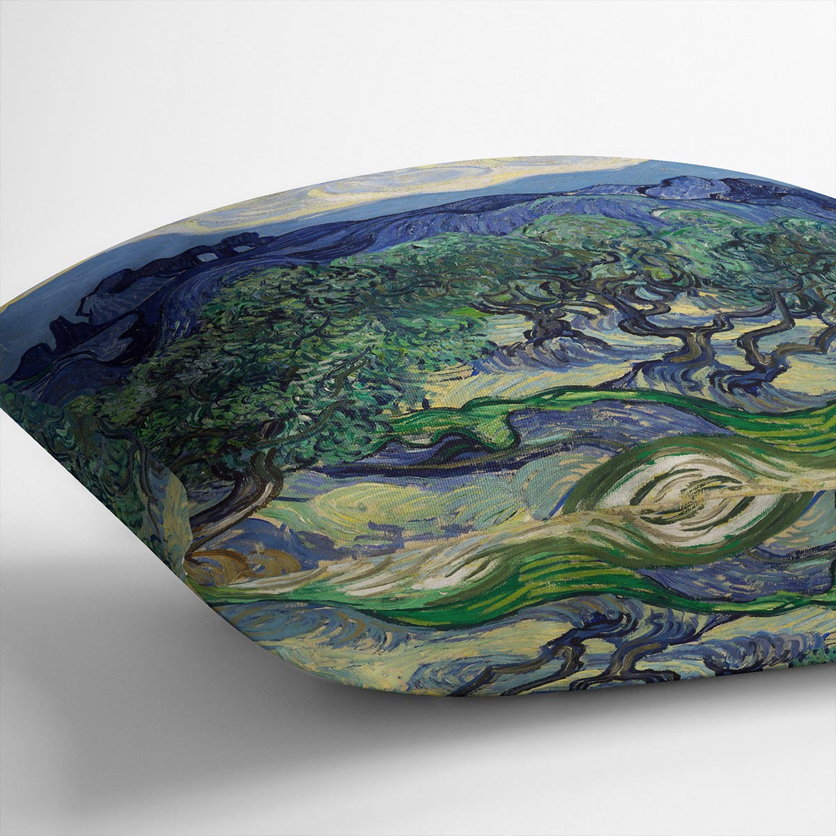 The Olive Trees Cushion featuring vibrant abstract designs on luxurious vegan faux suede, showcasing its plush filling and handmade quality.