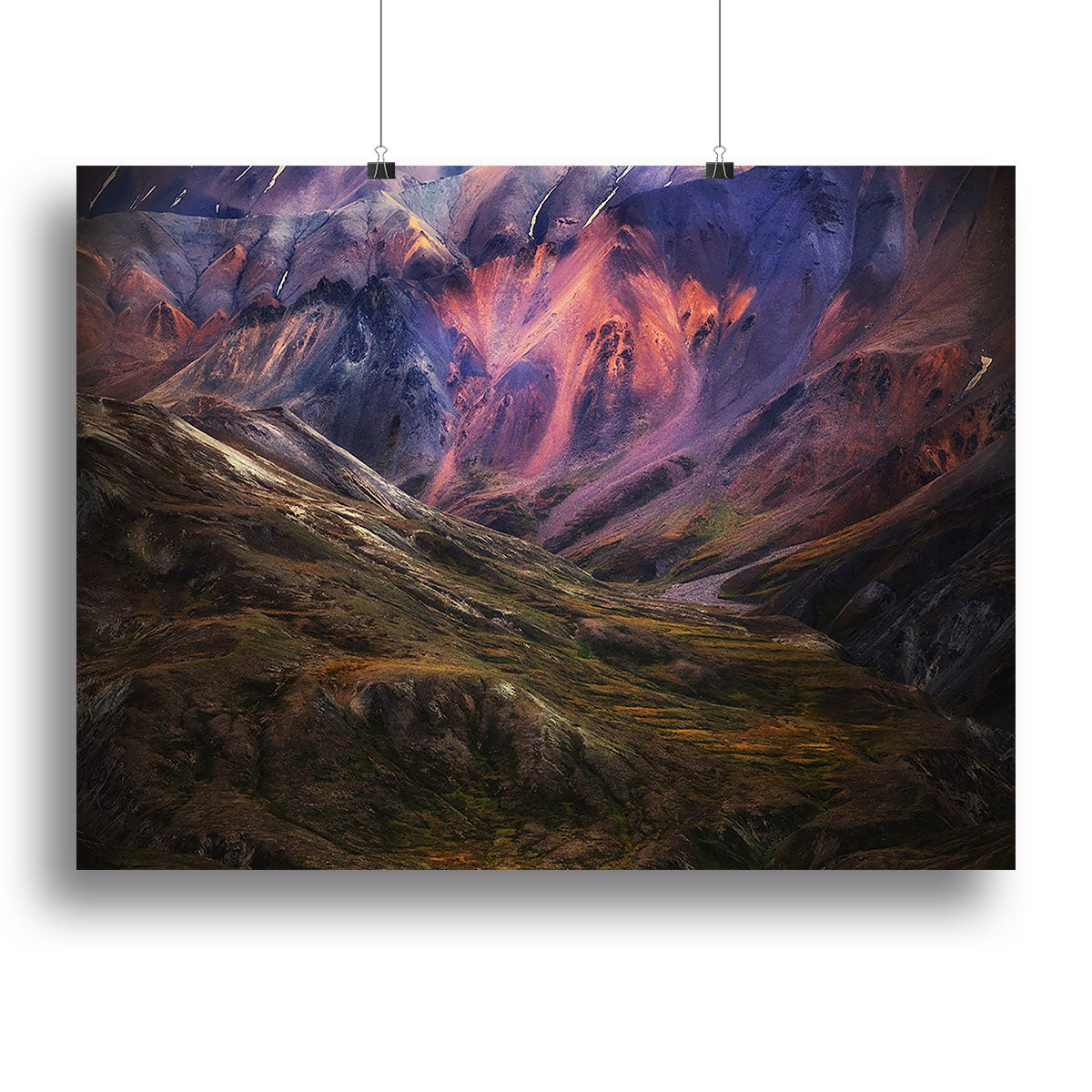 A vibrant canvas print featuring pink mountains against a serene sky, perfect for home decor.