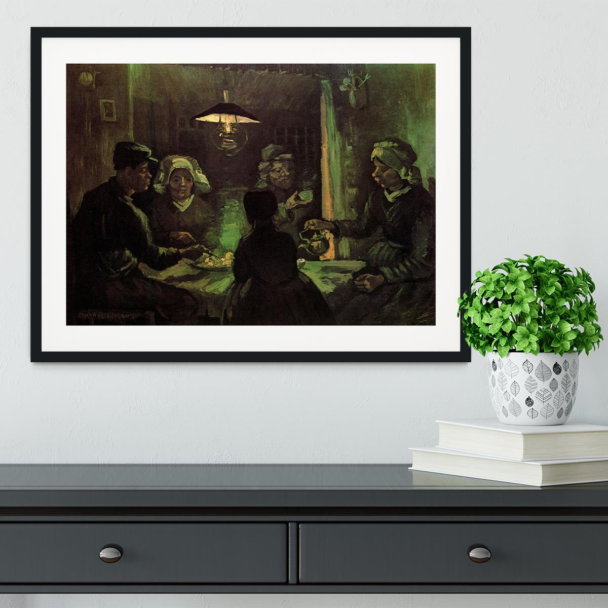 Framed print of Van Gogh's The Potato Eaters, showcasing vibrant colors and quality craftsmanship.
