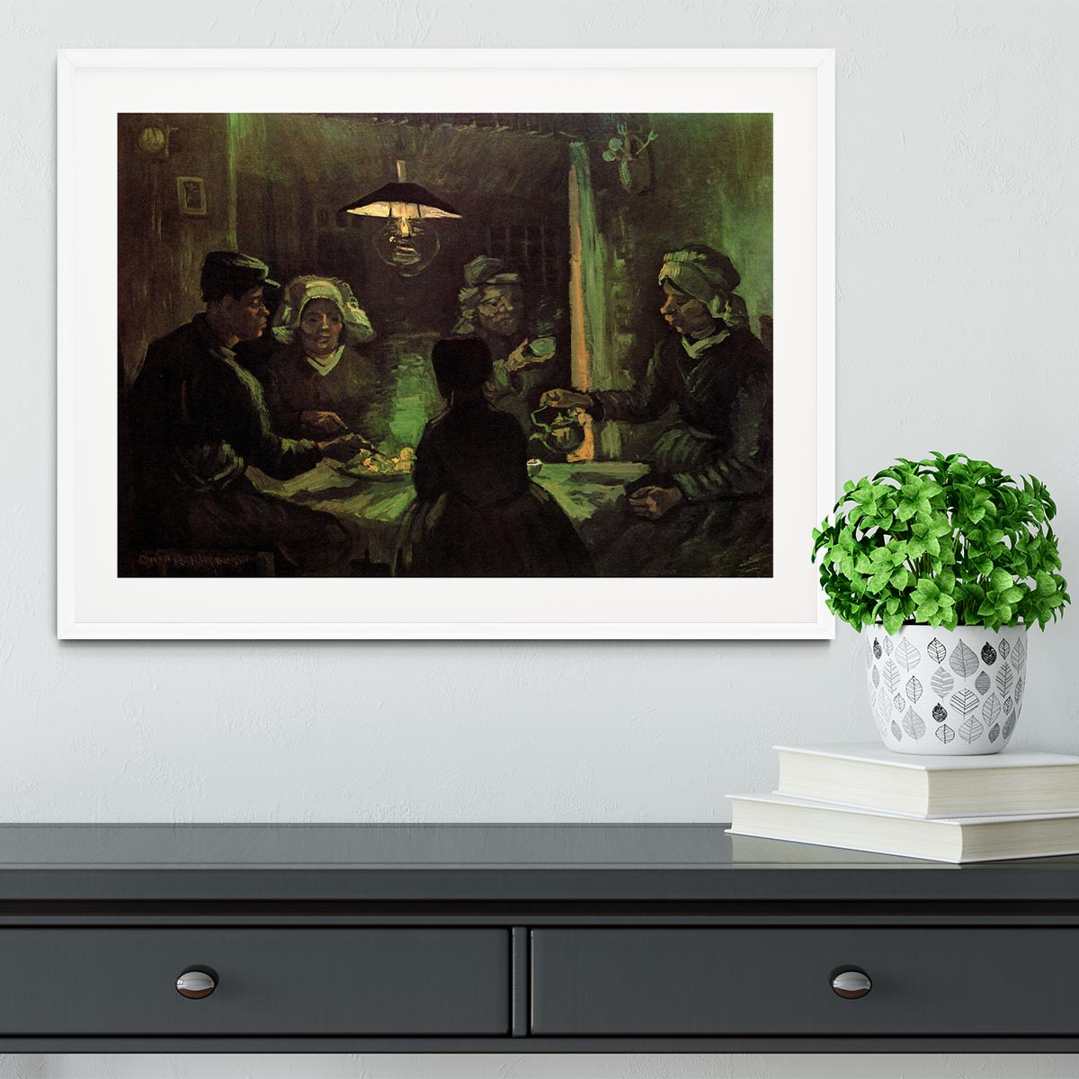 Framed print of Van Gogh's The Potato Eaters, showcasing vibrant colors and quality craftsmanship.