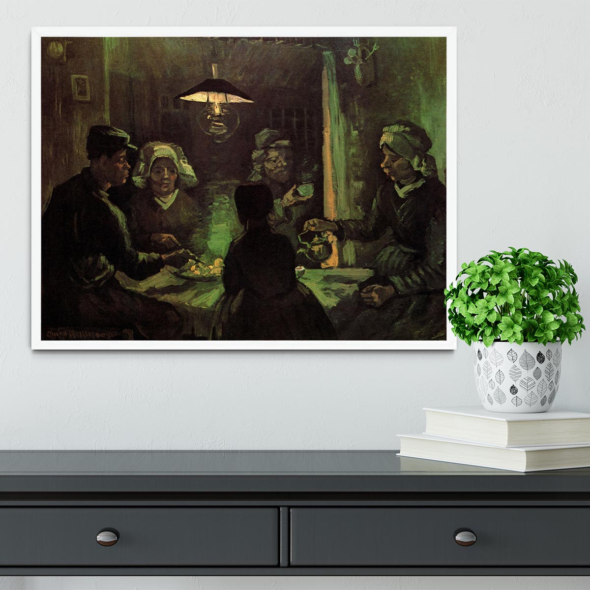 Framed print of Van Gogh's The Potato Eaters, showcasing vibrant colors and quality craftsmanship.