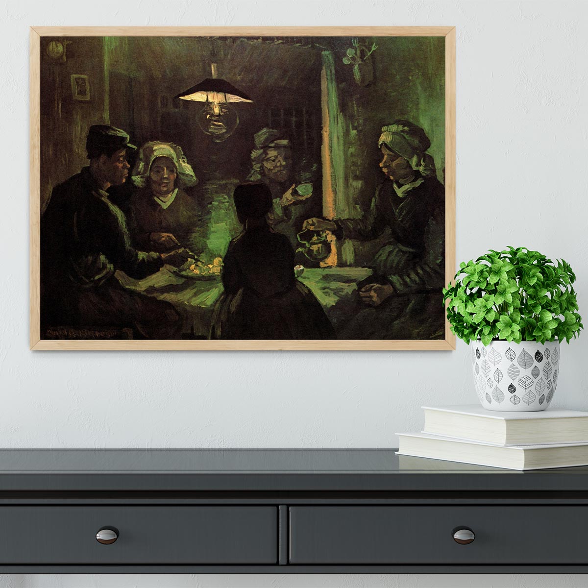 Framed print of Van Gogh's The Potato Eaters, showcasing vibrant colors and quality craftsmanship.