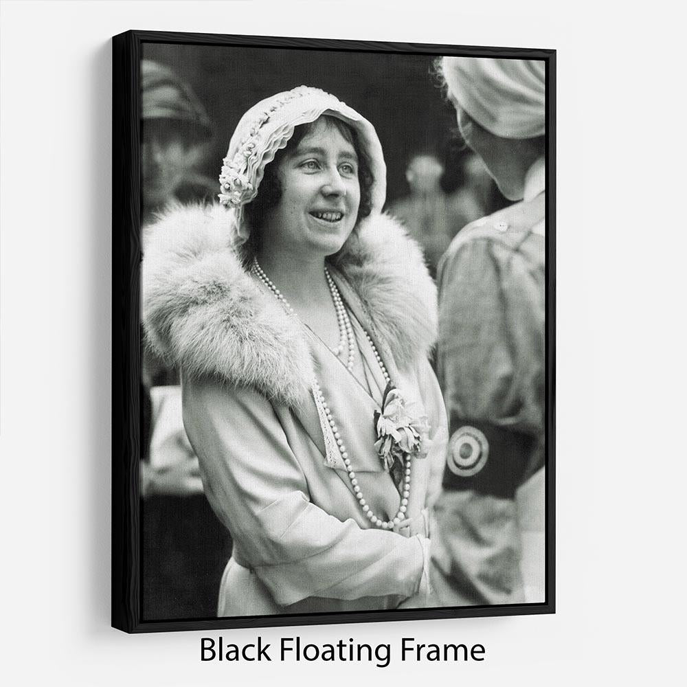 The Queen Mother Floating Frame showcasing vibrant abstract art in an elegant wooden frame.