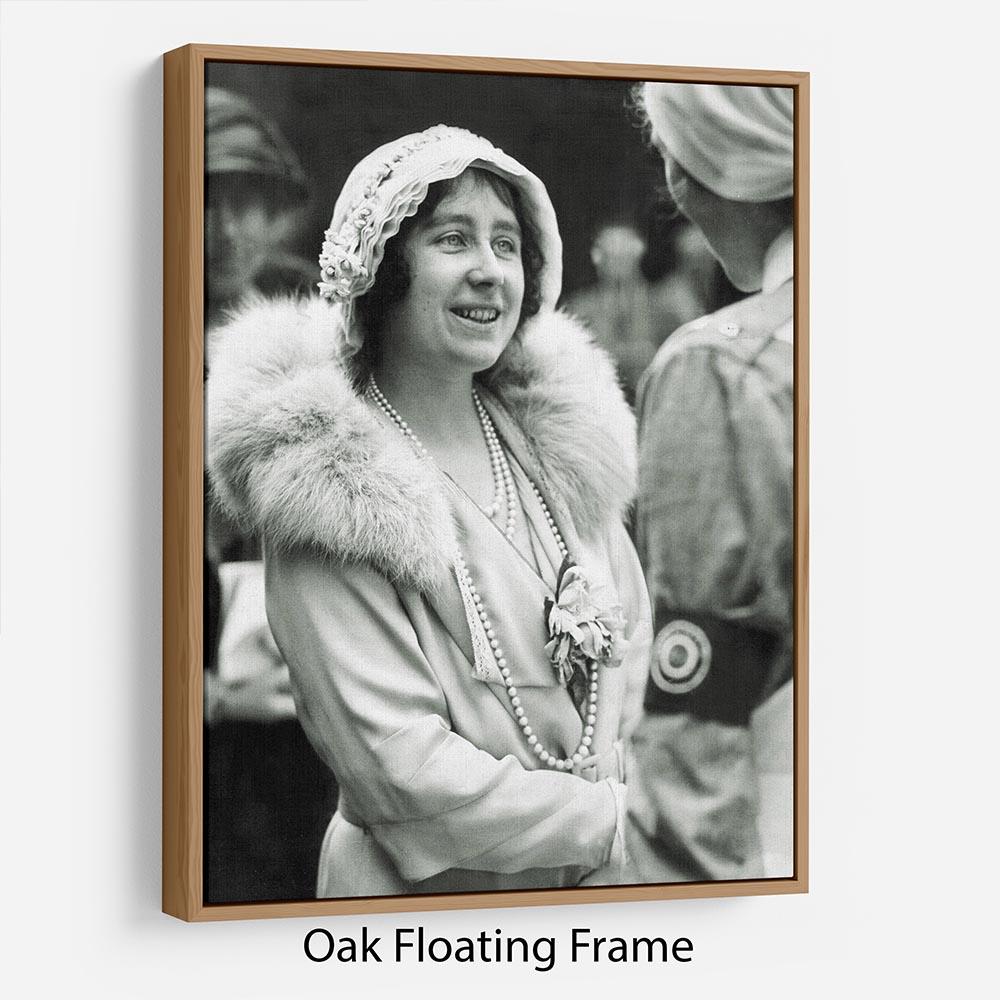 The Queen Mother Floating Frame showcasing vibrant abstract art in an elegant wooden frame.