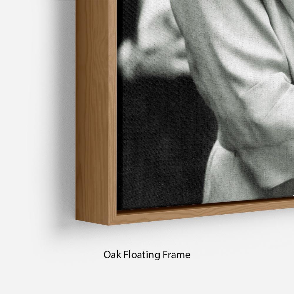 The Queen Mother Floating Frame showcasing vibrant abstract art in an elegant wooden frame.