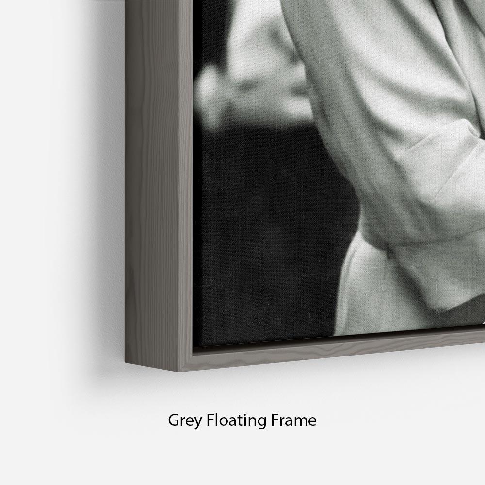 The Queen Mother Floating Frame showcasing vibrant abstract art in an elegant wooden frame.