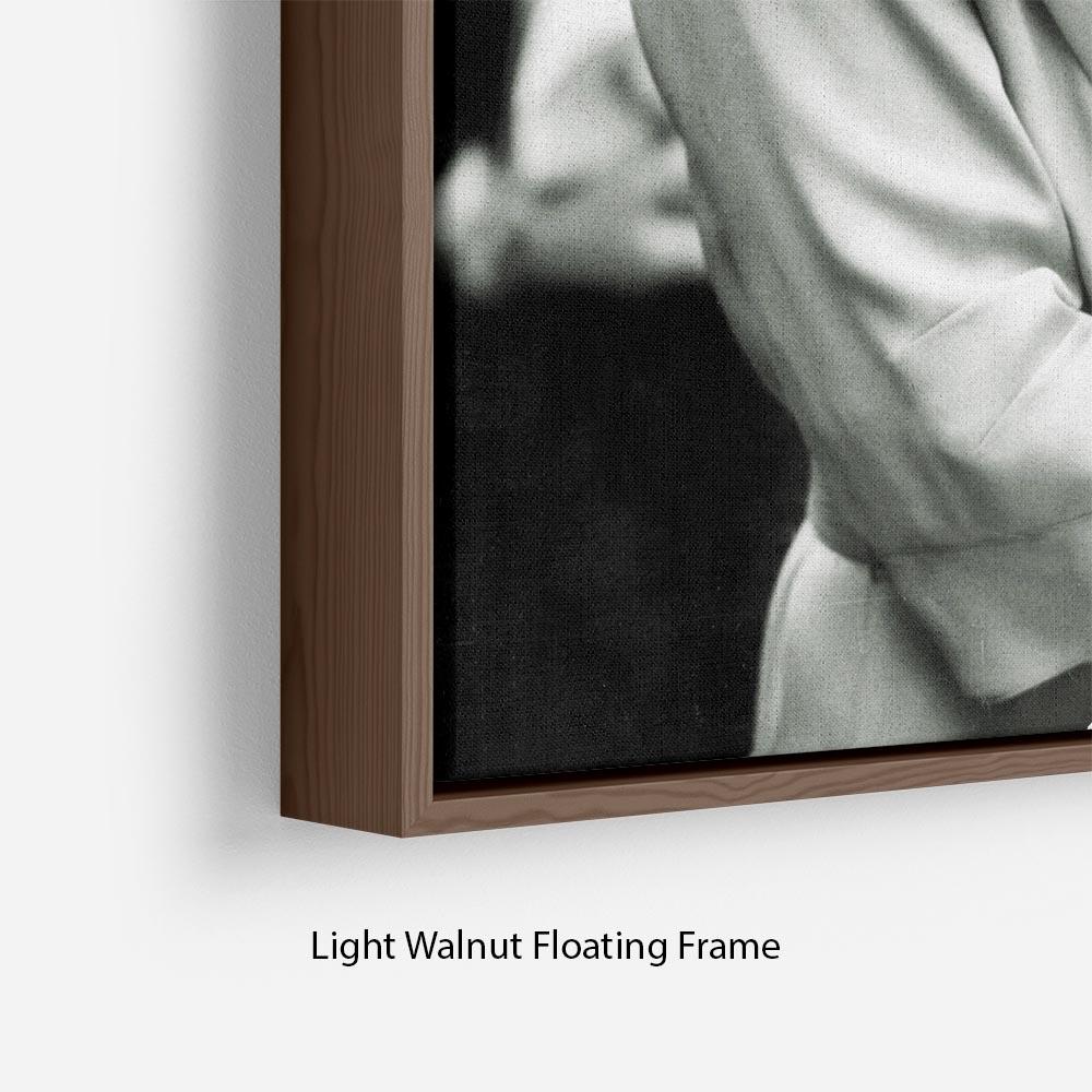 The Queen Mother Floating Frame showcasing vibrant abstract art in an elegant wooden frame.