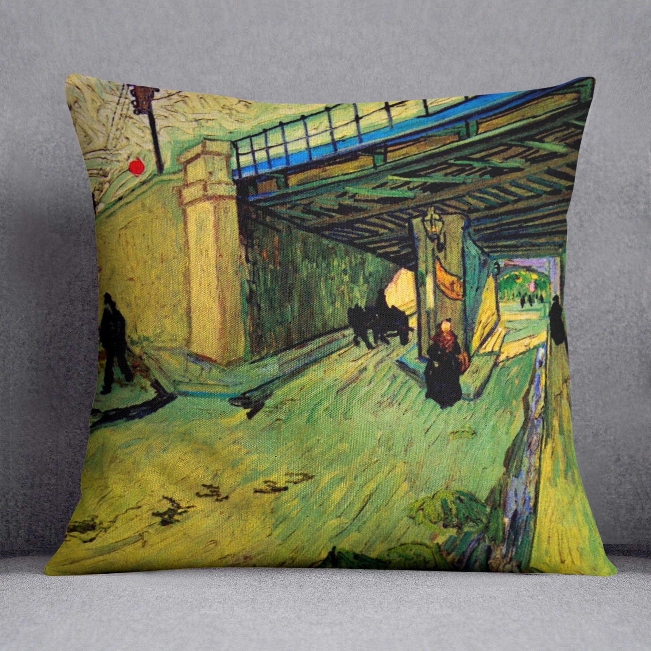 A vibrant cushion featuring Van Gogh's Railway Bridge over Avenue Montmajour, made from soft vegan faux suede.