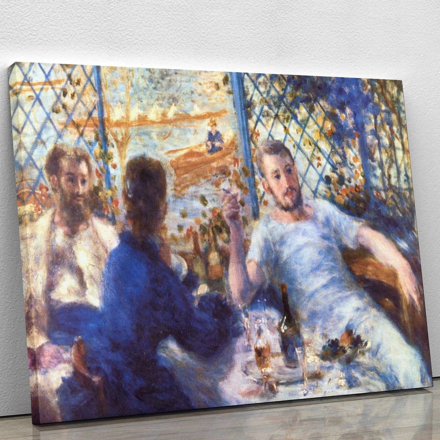 The Rowers Lunch by Renoir canvas print showcasing a serene outdoor dining scene with friends by the water.