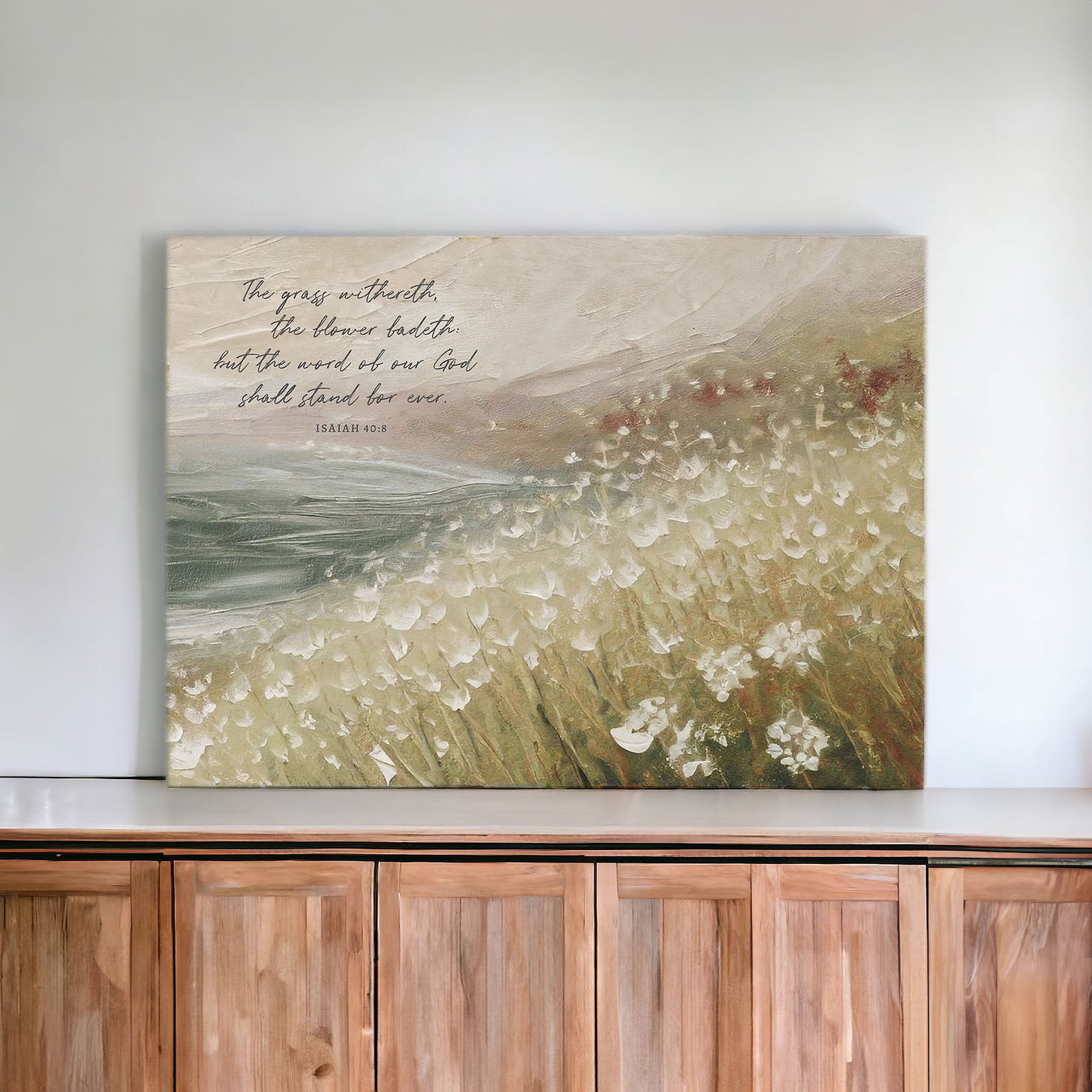 Gallery-wrapped canvas featuring serene landscape and scripture from Isaiah 40:8, perfect for home decor.