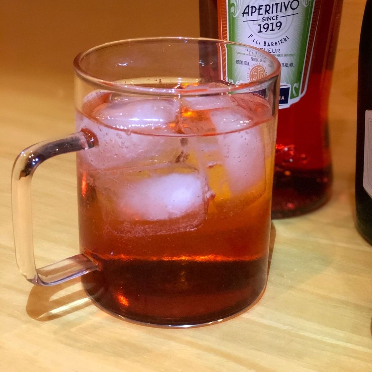 A clear Thermo Glass Mug with a 17 oz capacity, showcasing its elegant design and high-temperature resistance, perfect for hot and cold beverages.