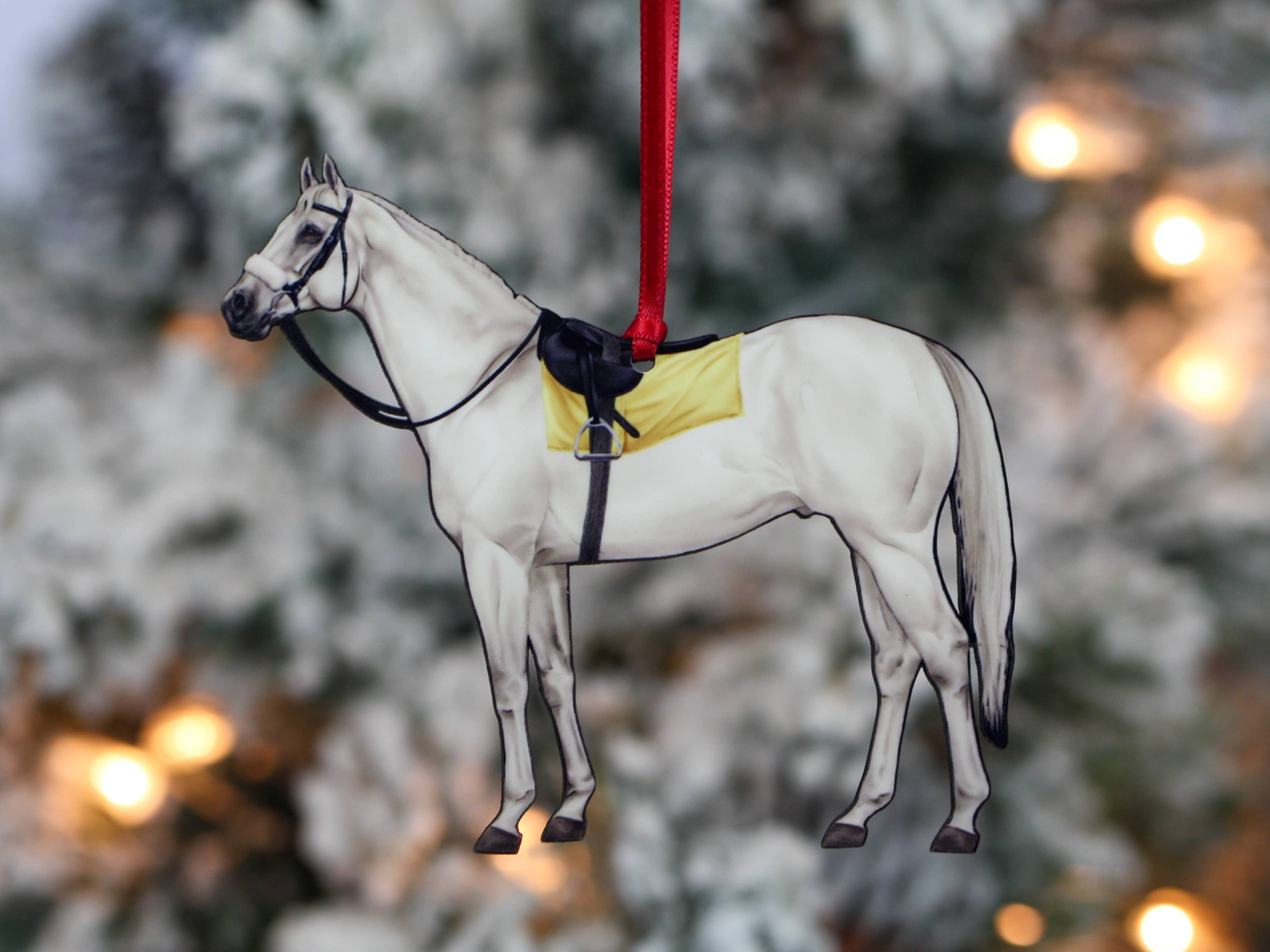 Thoroughbred Race Horse ornament in white and light gray, showcasing intricate details and glossy finish, perfect for holiday decor.