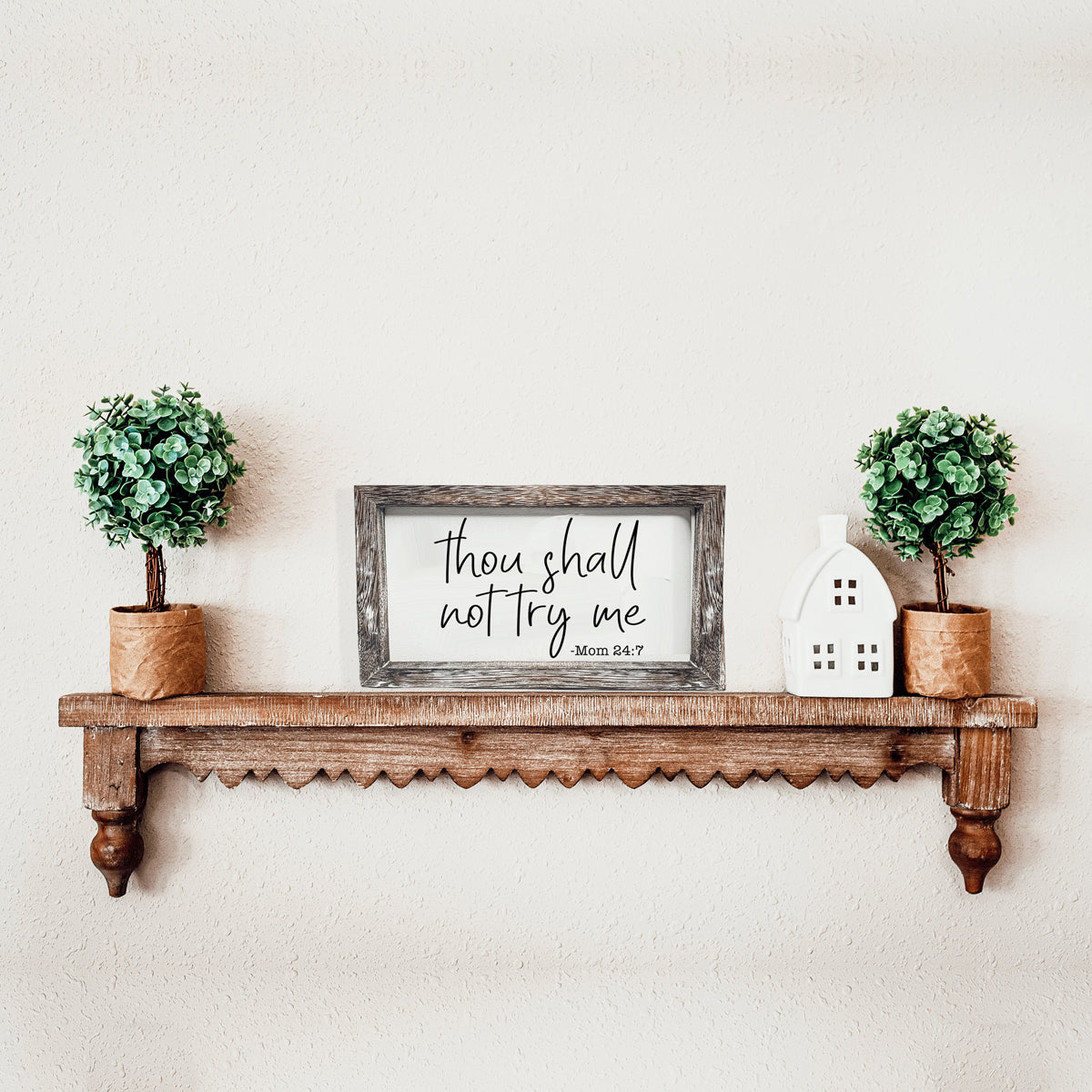 A humorous wooden sign reading 'Thou Shall Not Try Me Mom 24:7', crafted from premium Paulownia wood, featuring a stylish frame.