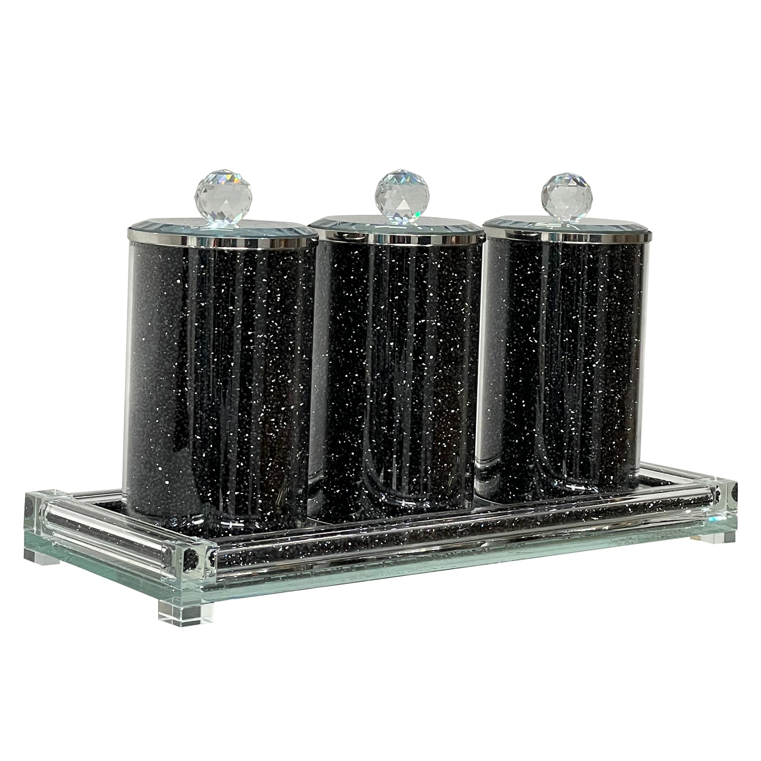 Three glass canisters on a tray, featuring black crushed diamond glass design with elegant glass lids.