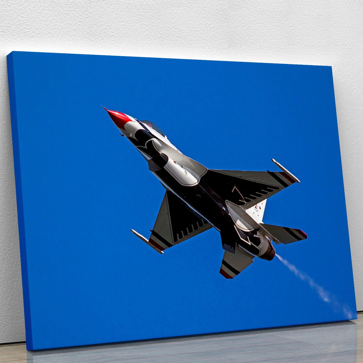 Thunderbirds F-16 fighter jet canvas print showcasing vibrant colors and dynamic design, perfect for aviation enthusiasts.