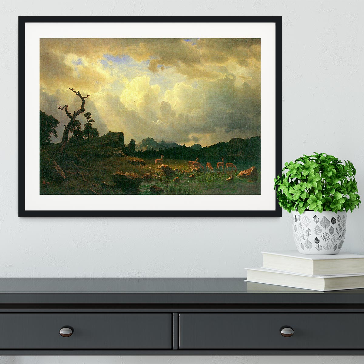 Framed print of Thunderstorms in the Rocky Mountains by Bierstadt, showcasing vibrant colors and intricate details in a handmade frame.