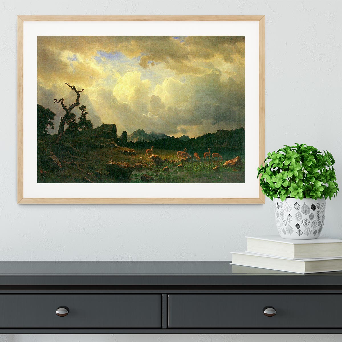 Framed print of Thunderstorms in the Rocky Mountains by Bierstadt, showcasing vibrant colors and intricate details in a handmade frame.