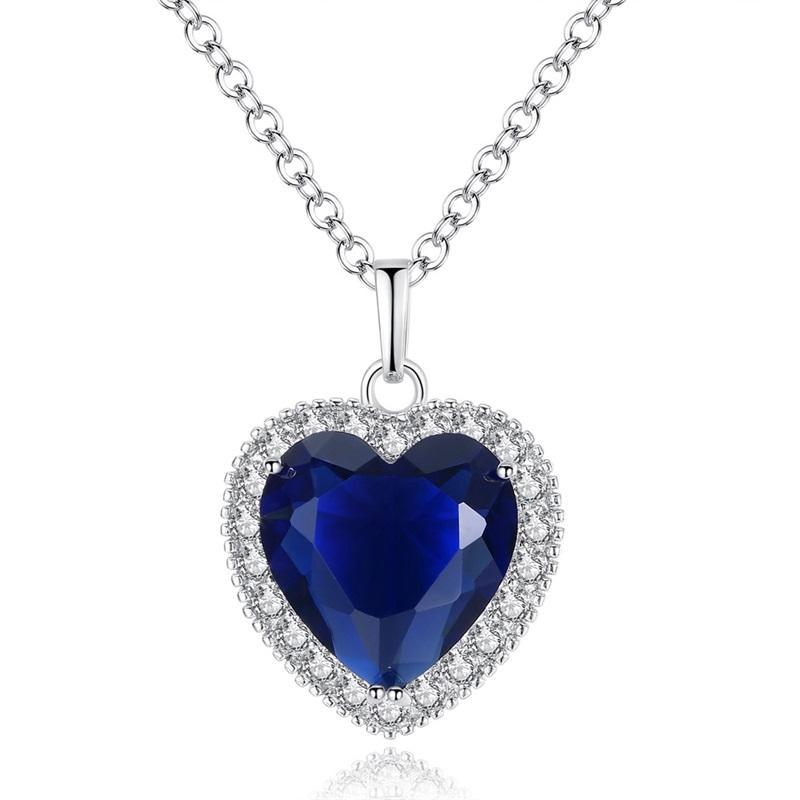 Titanic Heart of Ocean blue love forever pendant necklace featuring a blue heart pendant, titanium and gold plating, and cubic zirconia accents.