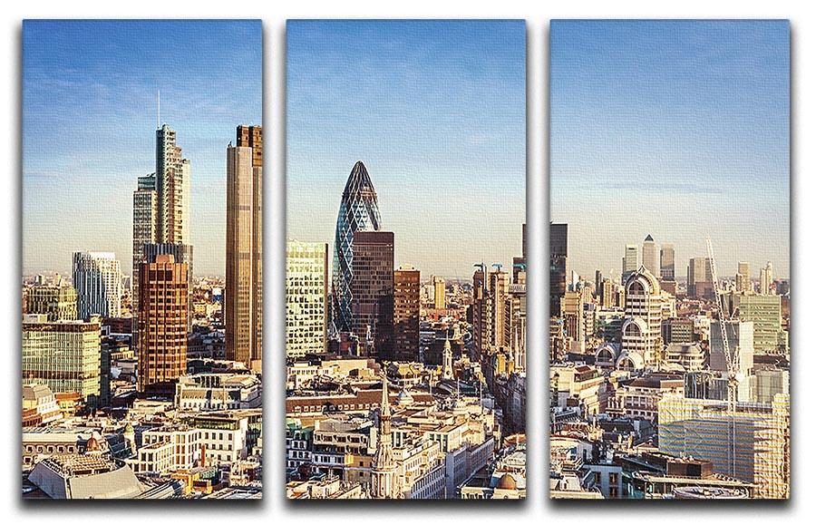 A beautiful 3-panel canvas print featuring the iconic Tower Lloyds of London and Canary Wharf, showcasing vibrant colors and intricate details.