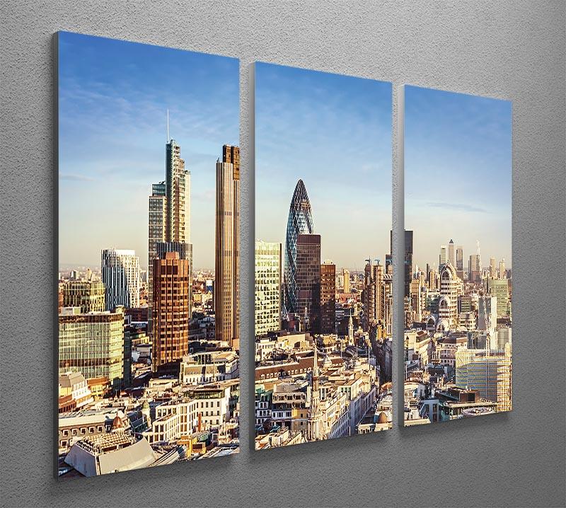 A beautiful 3-panel canvas print featuring the iconic Tower Lloyds of London and Canary Wharf, showcasing vibrant colors and intricate details.
