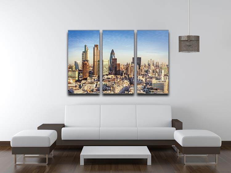 A beautiful 3-panel canvas print featuring the iconic Tower Lloyds of London and Canary Wharf, showcasing vibrant colors and intricate details.