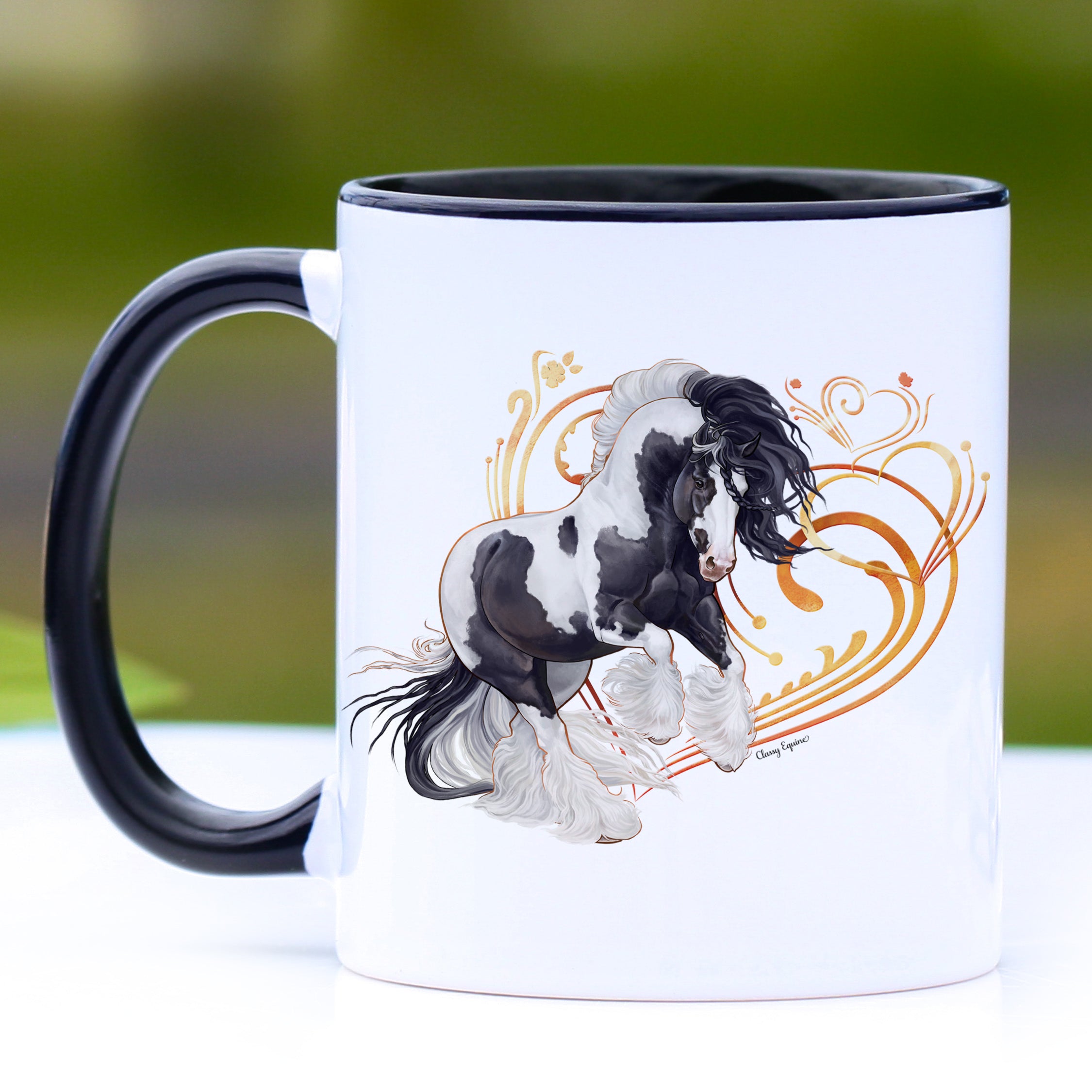 A stylish black and white ceramic mug featuring a traditional Gypsy horse design, with a black handle and interior.