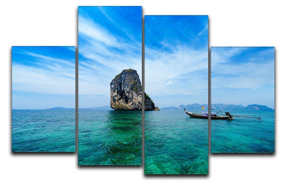 A beautiful 4-split canvas artwork featuring a traditional Thai boat on a vibrant blue sea, showcasing intricate details and serene colors.