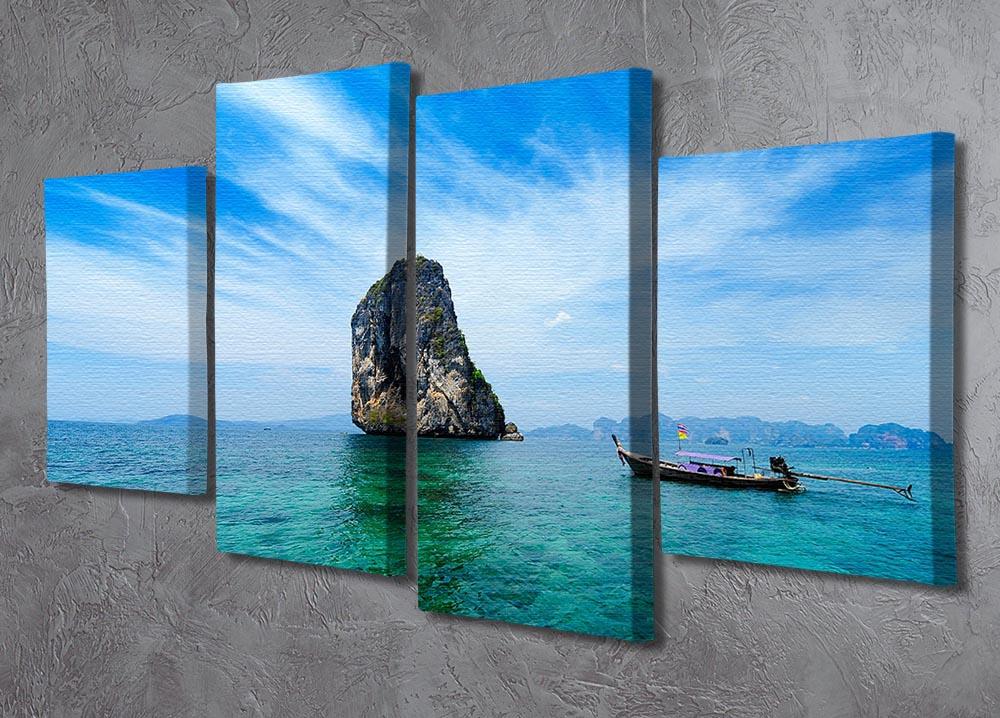 A beautiful 4-split canvas artwork featuring a traditional Thai boat on a vibrant blue sea, showcasing intricate details and serene colors.