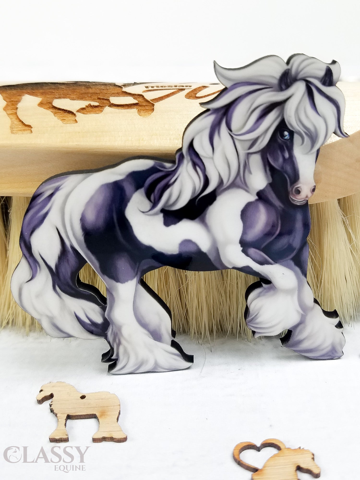 Traditional Tobiano Gypsy Horse Ornament in black and white, handmade from composite wood with a ribbon for hanging.