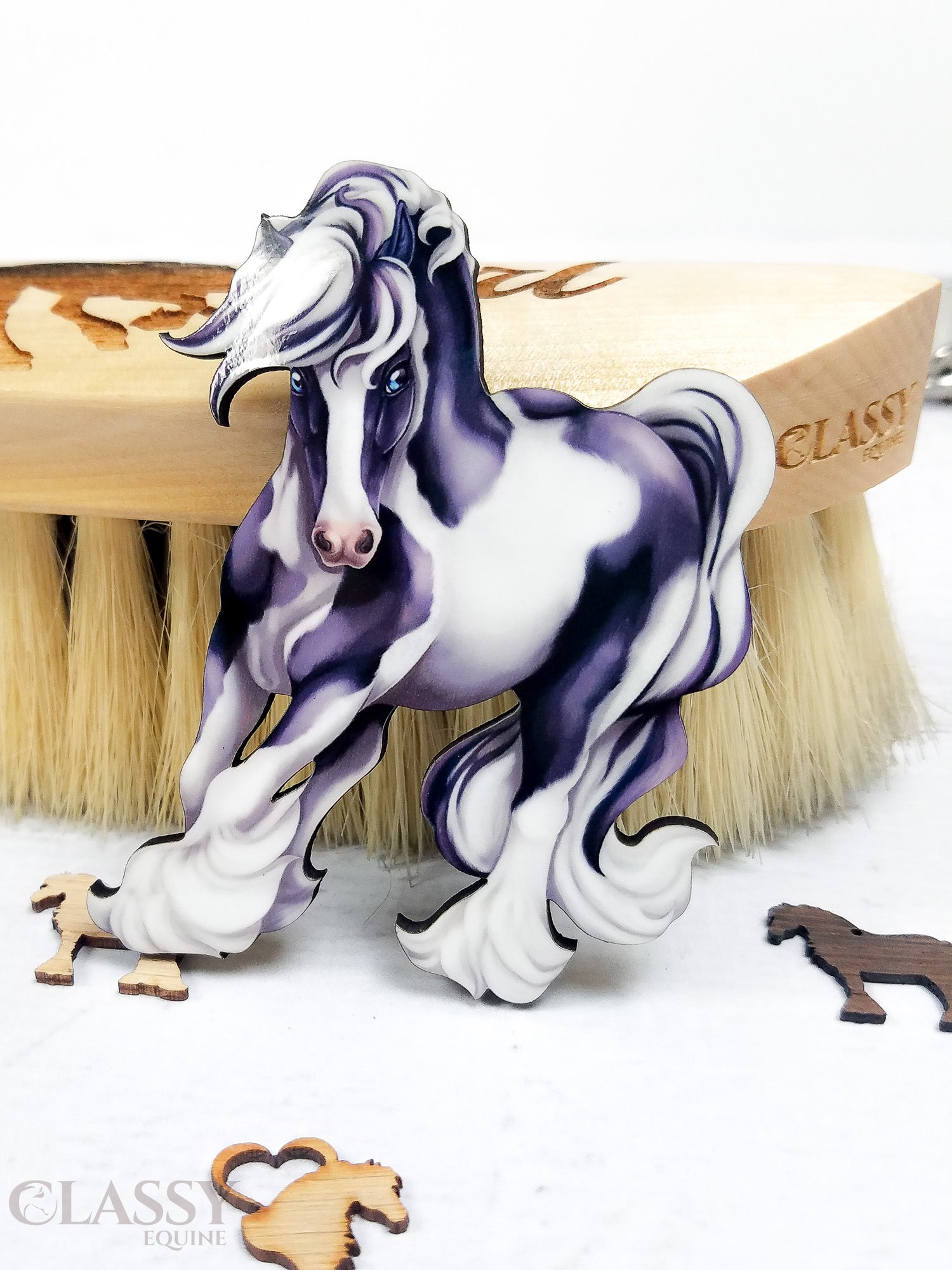 Traditional Turning Tobiano Gypsy Horse Ornament in black and white, handmade from composite wood with a ribbon for hanging.