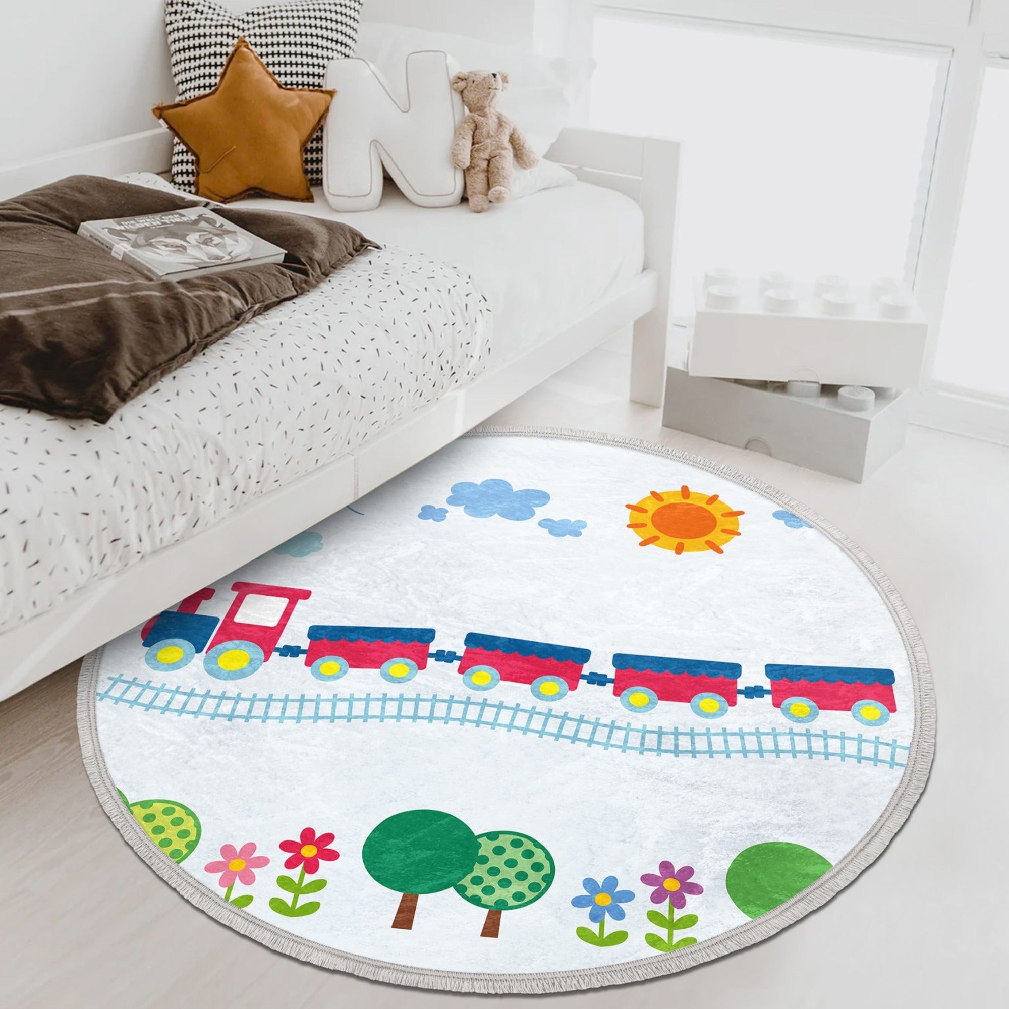 Train Round Rug featuring a colorful train design, made of soft velvet fabric, perfect for kids' rooms and nurseries.